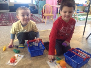 Children playing the Rainbow Food shopping game