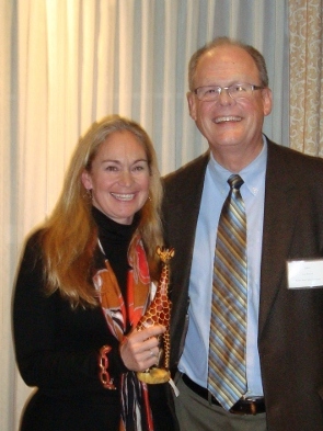 Dr. Tory Rogers and Dr. John Bancroft with Maine Children's Alliance Giraffe Award