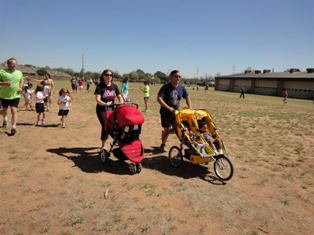 Notre Dame families participating in Golden Shoe Day event