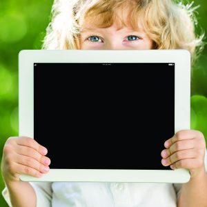 Child holding tablet PC